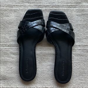 Reformation black leather slides
